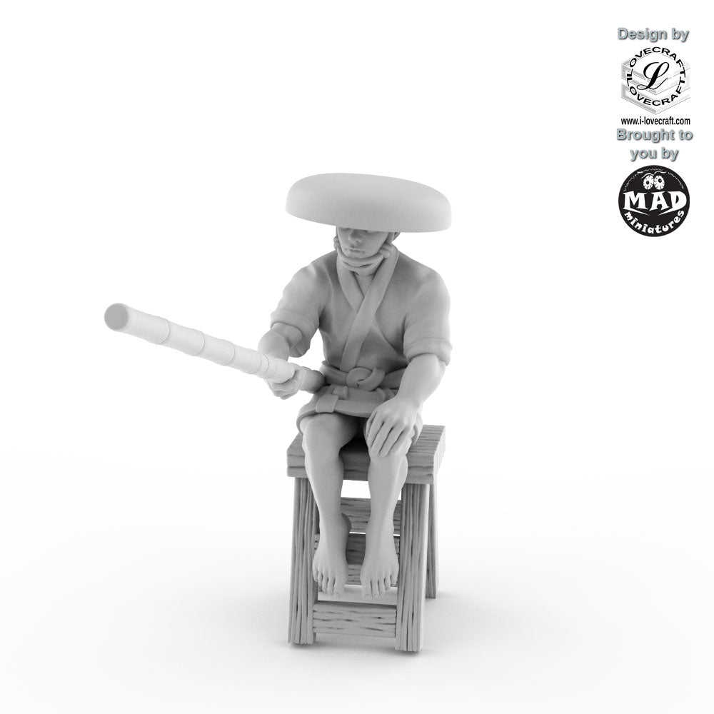 Fisher sitting on stool