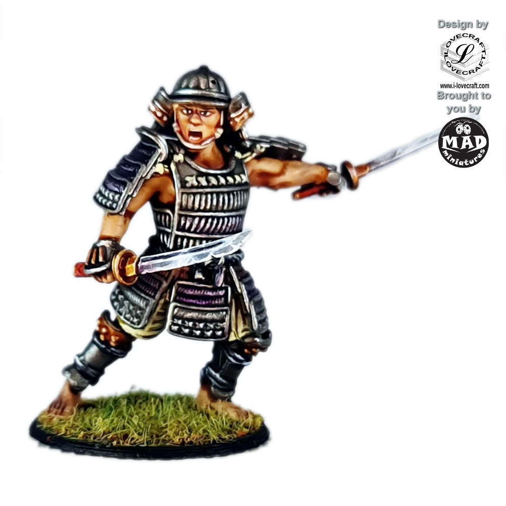Wokou Leader – A 28mm miniature designed by Iain Lovecraft, featuring a pirate warlord in samurai armor wielding dual swords, perfect for feudal Japan skirmish games.