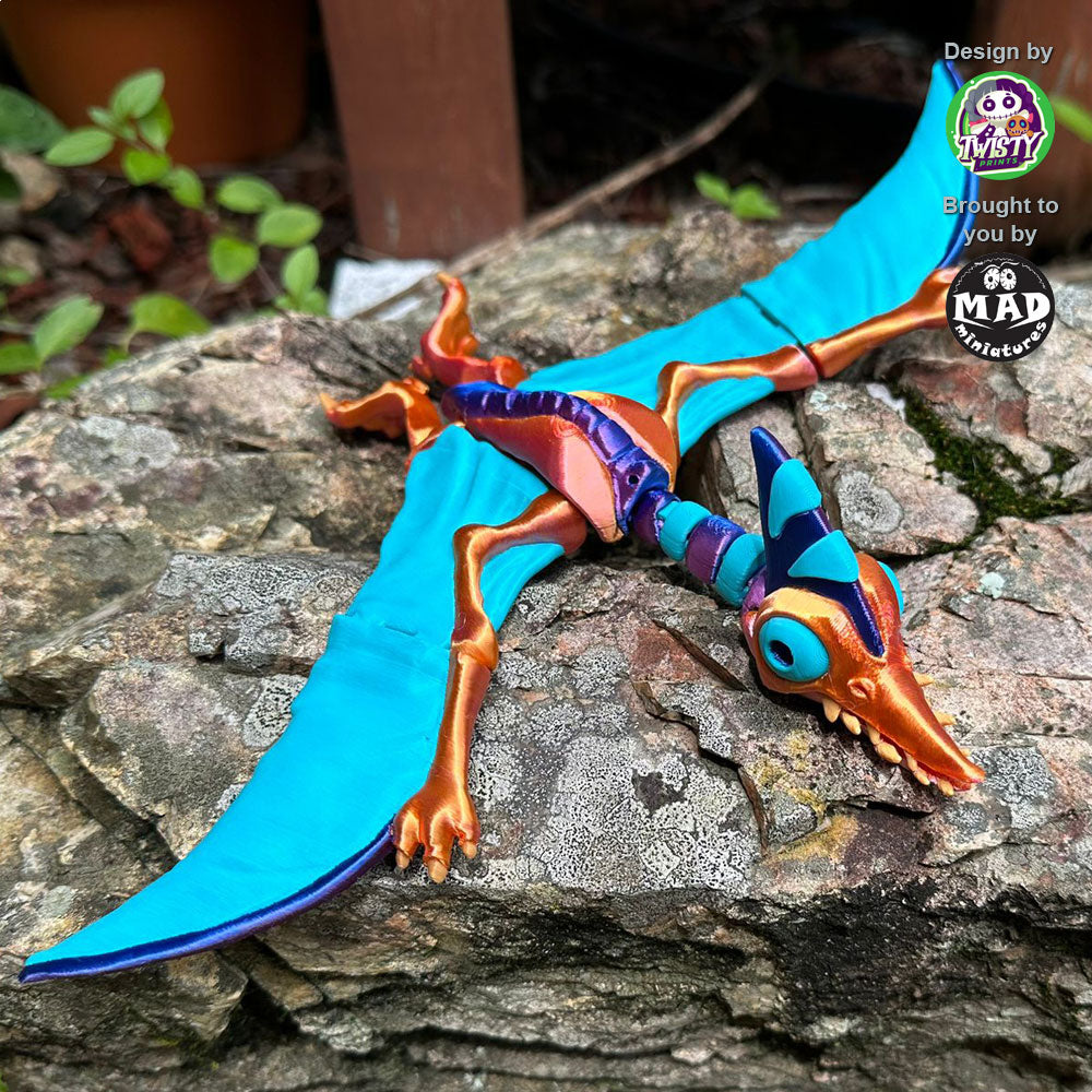 Top view of the Creepy Pterosaurus showcasing its color-changing, gemstone-like body designed by Twisty Prints
