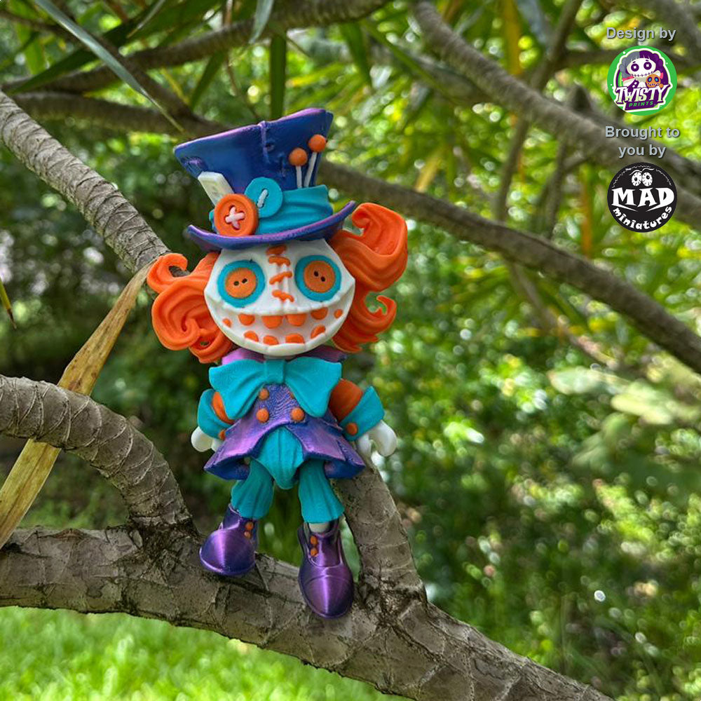 Mad Hatter perched on a tree, showcasing his eccentric style, created by Mad Miniatures