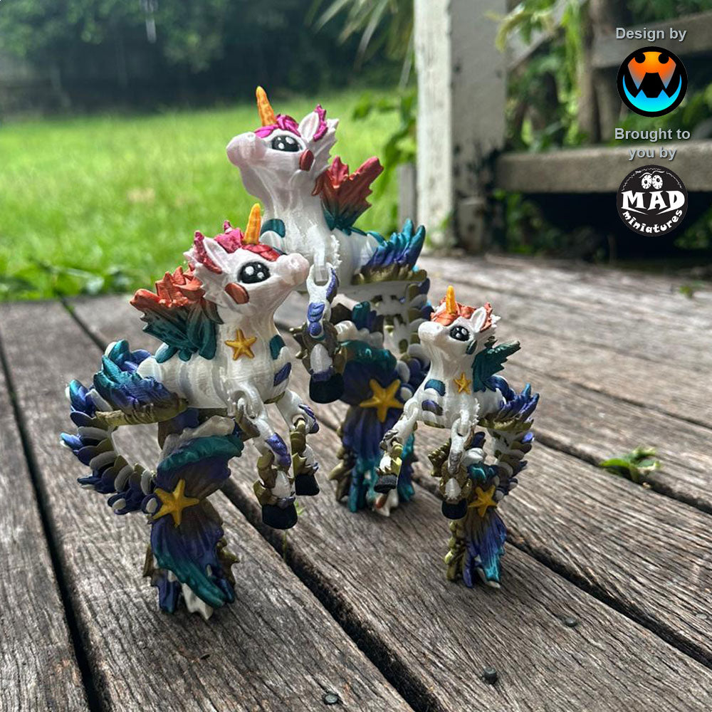 Articulated Rainbow Hippocampus Unicorn with a silky white body, shiny rainbow scales, and a golden horn. Each piece is unique due to the rainbow filament.