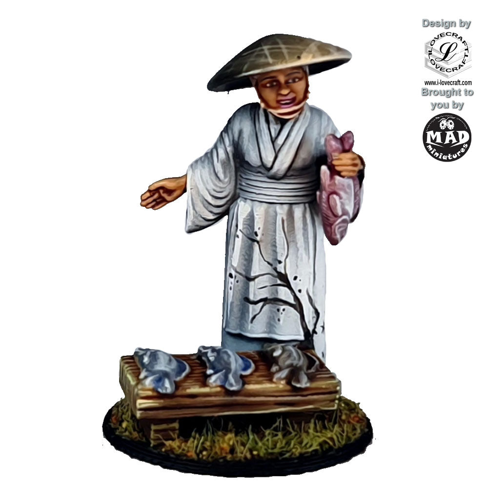 28mm miniature of an Edo-period fish vendor in a white robe and straw hat, selling fresh fish from a wooden table, designed for tabletop gaming and dioramas.