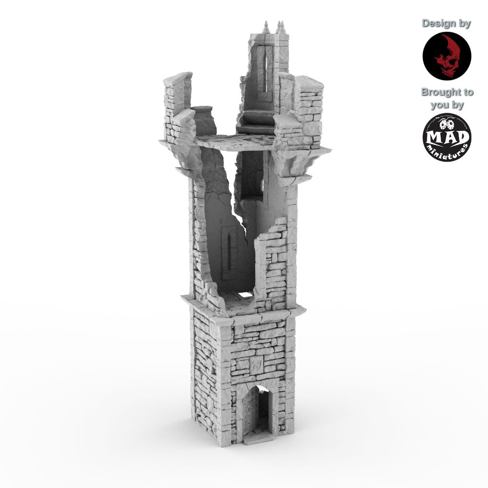 Ruined Watchtower terrain piece from the Helwick campaign. A tall, crumbling medieval-style tower with detailed stonework, designed by Terrablocks and made by Mad Miniatures.