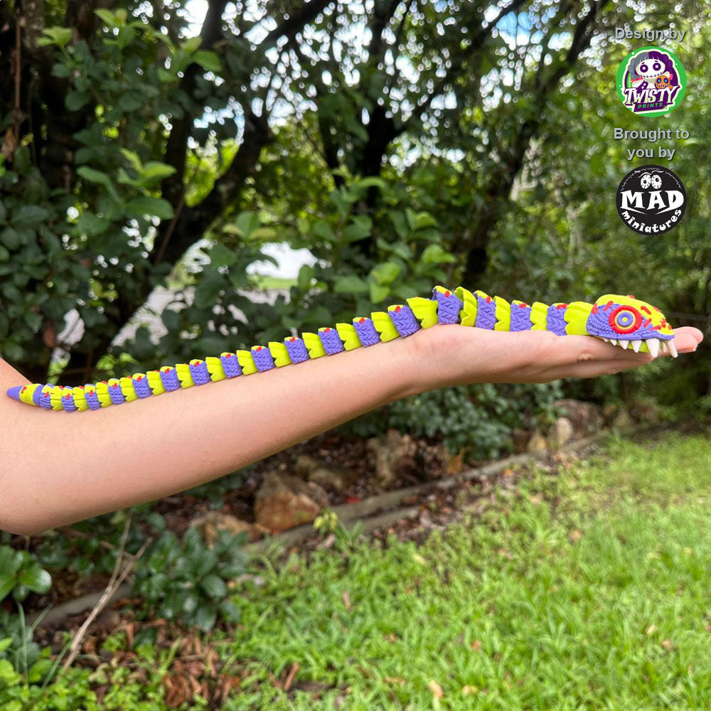 Big version of Stuffed Snake held by a person, showing off its impressive 430mm length and vibrant, creepy charm.