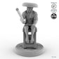 Fisher sitting on stool