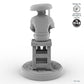 Fisher sitting on stool