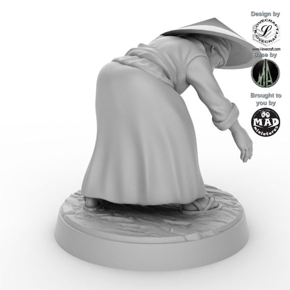 Field Worker with Rice Sheaf