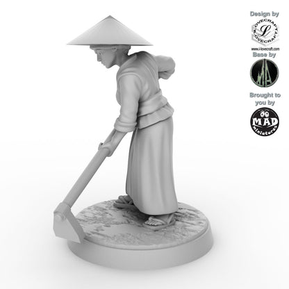 Field Worker with Hoe