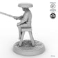Fisher sitting on stool