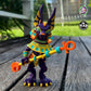 Articulated Anubis figure holding a golden staff with both hands