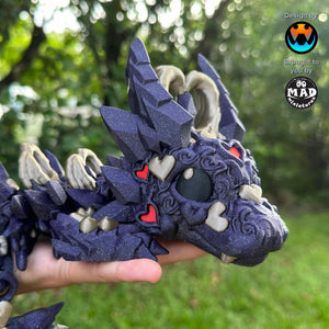 Baby Dark Heart Dragon – A sparkly purple articulated dragon with iridium gold details and red hearts, designed by Cinderwing and made by Mad Miniatures.