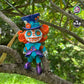 Mad Hatter perched on a tree, showcasing his eccentric style, created by Mad Miniatures