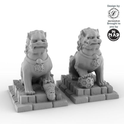Foo Dogs statues from Nippon Saga by Mad Miniatures and Iain Lovecraft, detailed tabletop guardian miniatures.