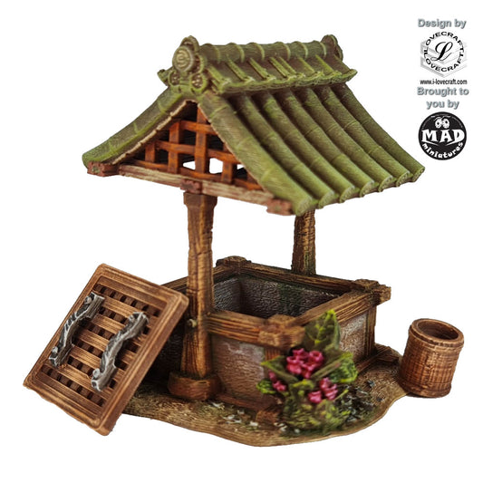 3D-printed Japanese-style village well with roof, removable cover, and bucket from the Nippon Saga collection by Mad Miniatures