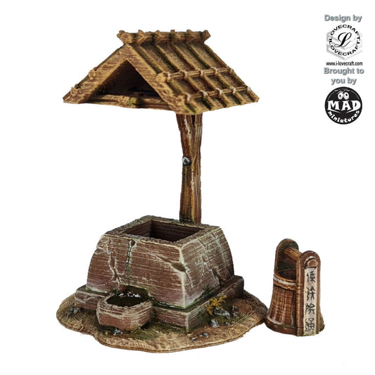 Well terrain piece with wooden roof and bucket from the Nippon Saga collection by Mad Miniatures