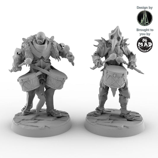 Two Orc Drummer miniatures with war drums by Mad Miniatures