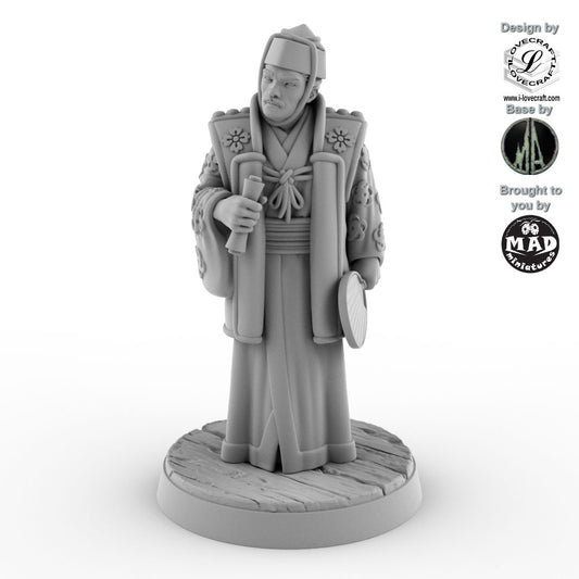 32 mm noble man miniature holding scroll and fan, wearing layered court robes – Nippon Saga model by Mad Miniatures.