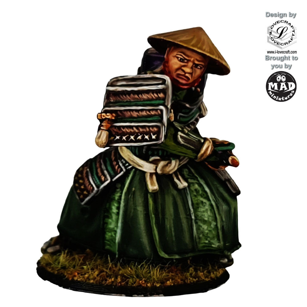 Painted 32 mm samurai swordsman miniature wearing a straw hat and drawing a katana – Nippon Saga by Mad Miniatures.
