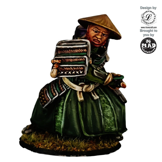 Painted 32 mm samurai swordsman miniature wearing a straw hat and drawing a katana – Nippon Saga by Mad Miniatures.