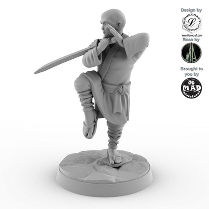 Shaolin Monk miniature with raised sword in a crane stance, designed by Iain Lovecraft and made by Mad Miniatures