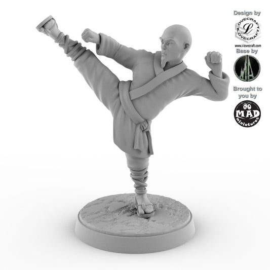 Shaolin Monk miniature performing a high martial arts kick, designed by Iain Lovecraft and made by Mad Miniatures