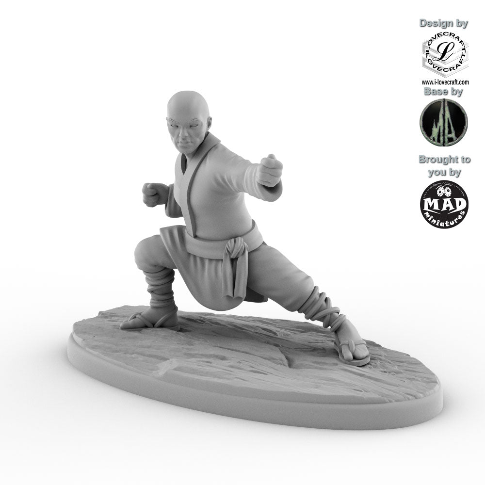 Shaolin Monk miniature in a martial arts stance, designed by Iain Lovecraft and made by Mad Miniatures