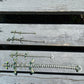 Length comparison of all four sizes of the articulated steampunk dragon in natural green, brown, and metallic colors